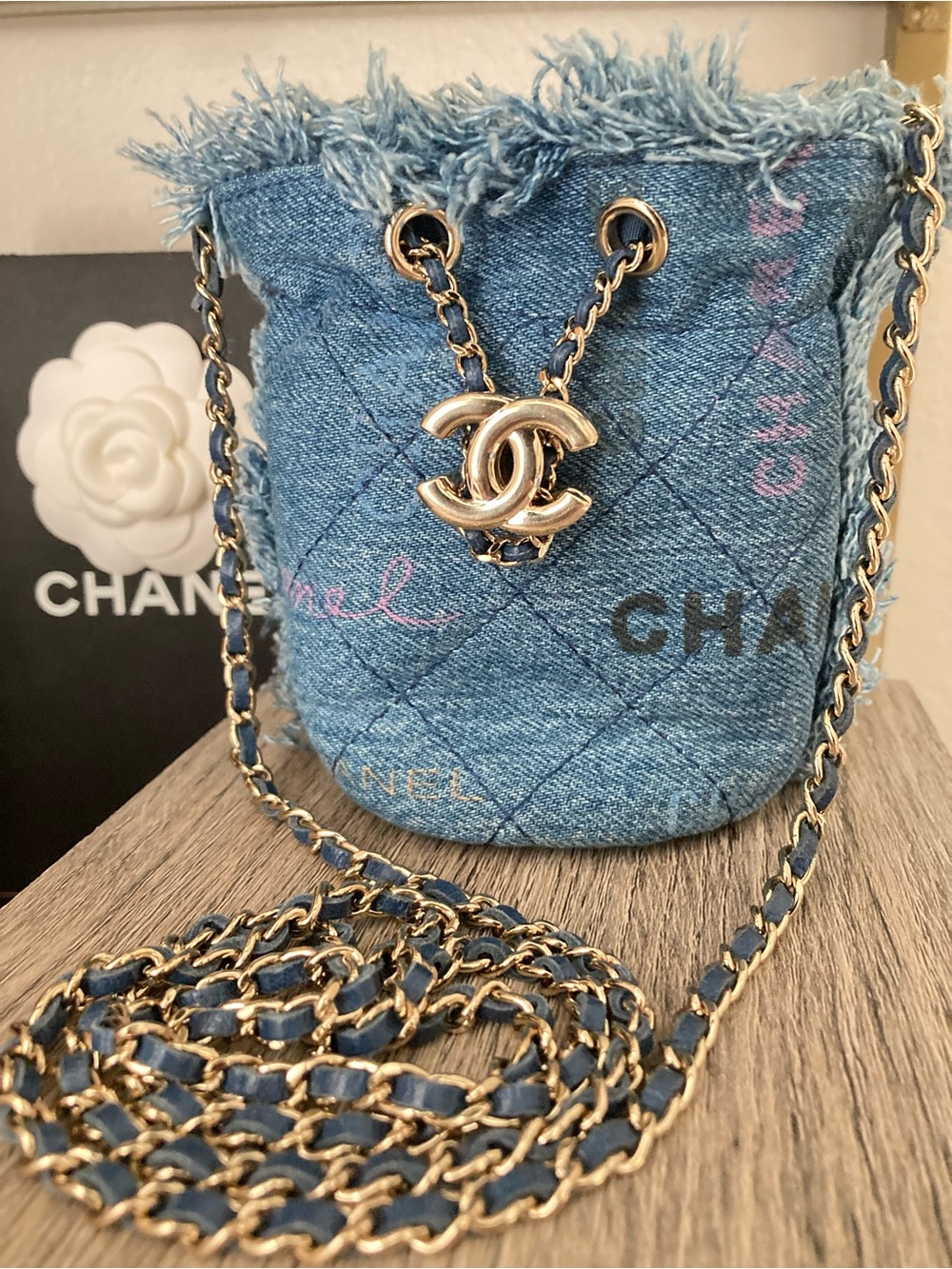 CHANEL Blue Quilted Denim Bucket Crossbody with Gold CC Chain